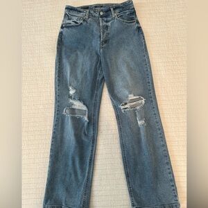 Super high-waisted distressed jeans, size 10. New without tags, never worn
